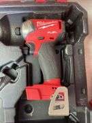 Milwaukee pack out and tool box with drill, impact, battery and charger