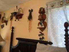 WOODEN SHELVES AND RUSTIC DECOR ON WALL