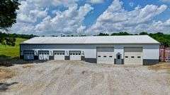 Parcel 1: 9.4 Acres with Farmstead, Pond and Cabin.