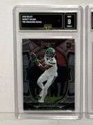 2022 Select Garrett Wilson Concourse Rookie (GMA 9), 2022 Donruss Cooper Kupp Dominators (GMA 10), a