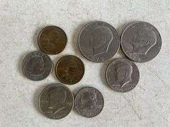 (2) Eisenhower dollar coins, (2) Kennedy half dollars, (2) Susan B. Anthony dollar coins, and (2) Sa