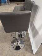 (4) matching grey leather swivel adjustable bar stools