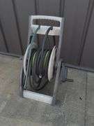 Garden hose with standing reel