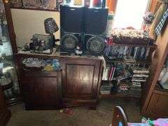 WOOD CABINET W/SPEAKERS AND SHELF OF DVD'S/CD'S