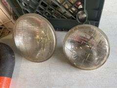 Vintage headlights and exhaust manifolds and pipes