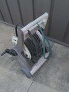 Garden hose with standing reel