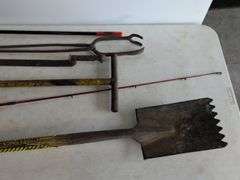 Firebird fishing rod, roofing shovel, tire iron, magnet, and other tools