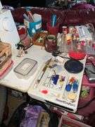 LARGE LOT OF SEWING SUPPLIES INCL. SINGER MACHINE, TABLE, OFFICE CHAIR