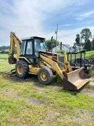 Caterpillar 416B Backhoe , 4x4 ( right side door window cracked ) Runs Good