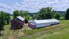 Parcel 1: 9.4 Acres with Farmstead, Pond and Cabin.