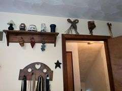 WOODEN SHELVES AND RUSTIC DECOR ON WALL