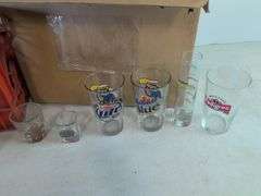 Drinking glasses, pitchers, and shot glasses with designs