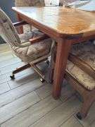 WOODEN TABLE WITH 4 ROLLING CHAIRS