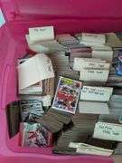 Tote full of 80s and 90s baseball, football, and basketball cards