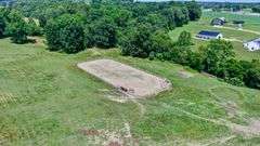 Parcel 2: 20.9 Acres with Riding Arena and Building Site.