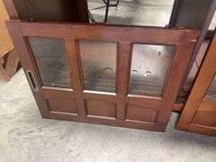Wooden TV stand with glass doors