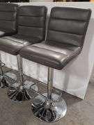 (4) matching grey leather swivel adjustable bar stools