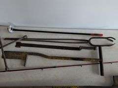 Firebird fishing rod, roofing shovel, tire iron, magnet, and other tools