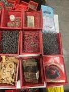 Tote of screws, woodworking supplies, and hardware