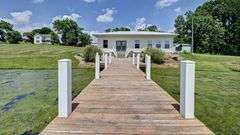 Parcel 1: 9.4 Acres with Farmstead, Pond and Cabin.