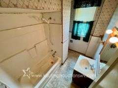 Fairmont 4 Bedroom Home with 4 Bay Garage