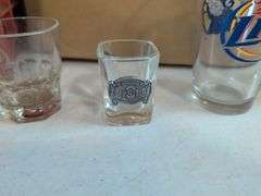 Drinking glasses, pitchers, and shot glasses with designs