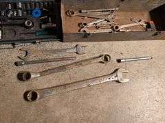 Metal toolboxes with wrenches and sockets