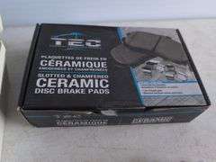 Dymo label maker kit, rolling ruler, and ceramic disc brake pads