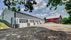 Parcel 1: 9.4 Acres with Farmstead, Pond and Cabin.