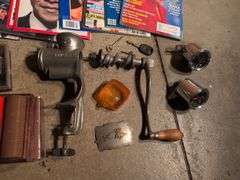Miscellaneous vintage items - Universal meat grinder, poker set, clippers, speedometers, belt buckle