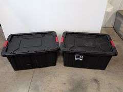 (2) black Sterilite industrial storage containers with red handles