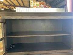 Dining room display cabinet with glass doors and shelving