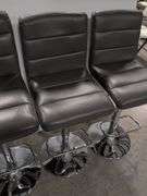 (4) matching grey leather swivel adjustable bar stools