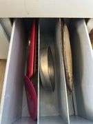 CONTENTS OF CUPBOARD PANS AND RAGS