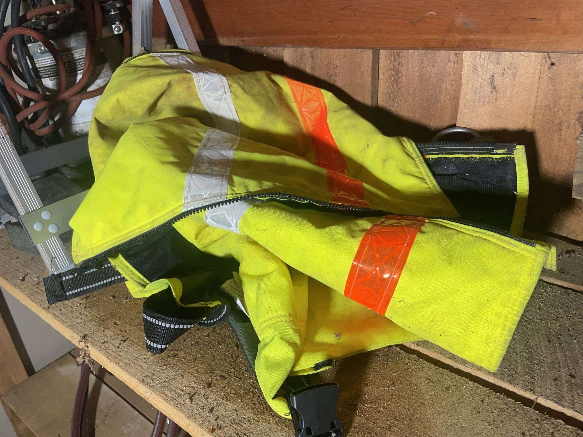 Reflective vest, paint sprayer, construction stand