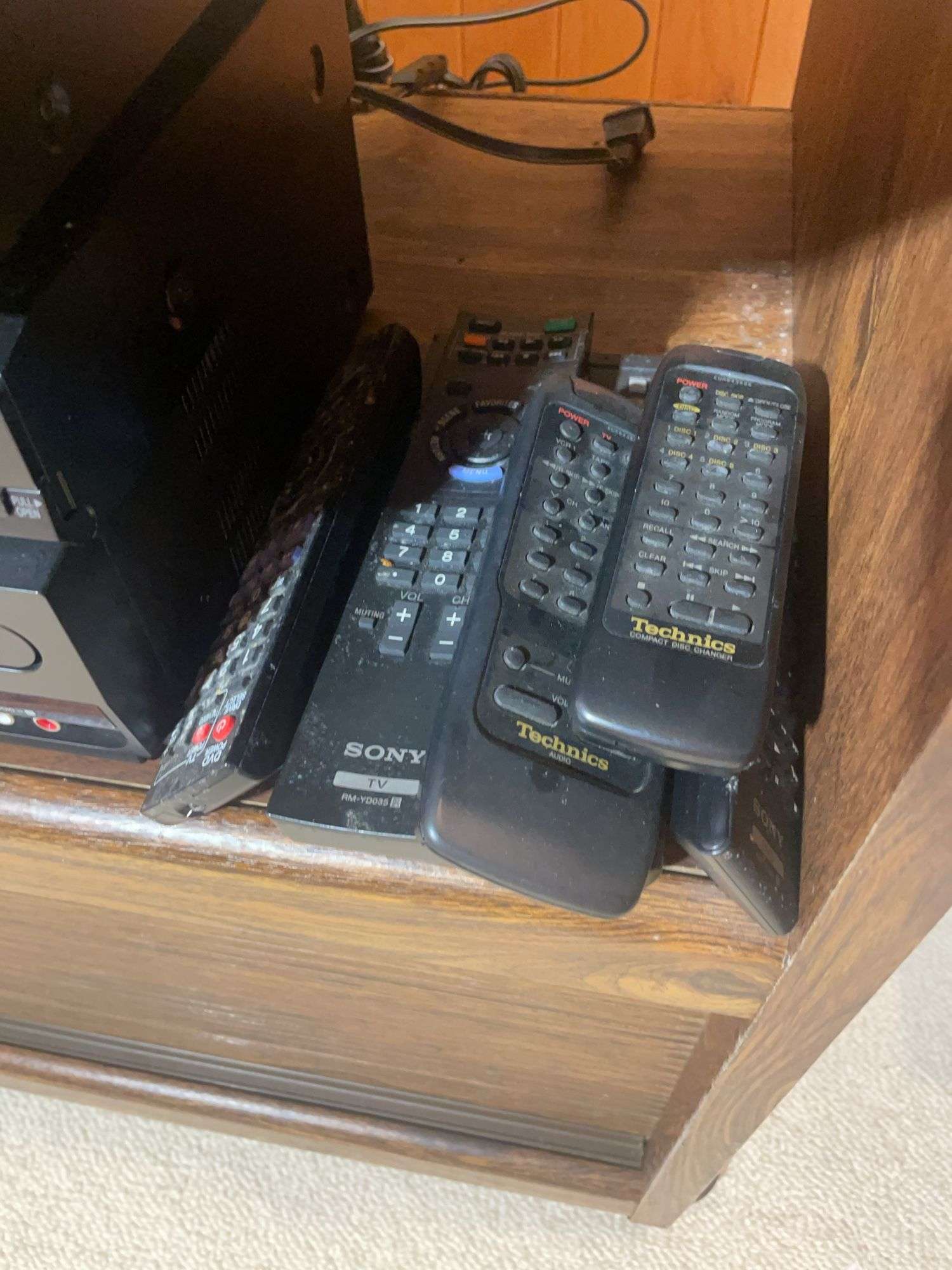 Wooden rolling stand with 40" Sony TV and DVD player and recorder