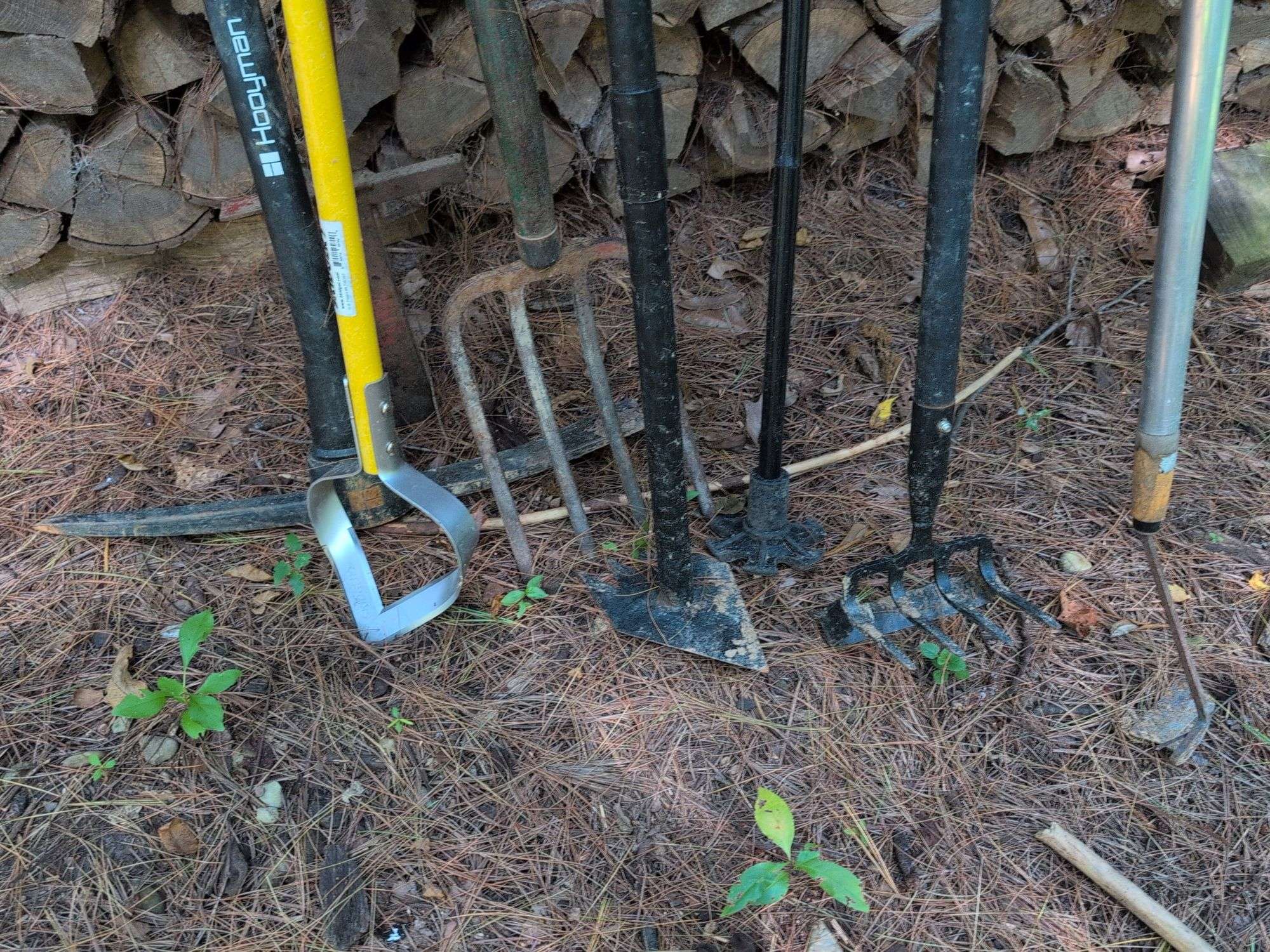Pickaxe, pitchfork, rake, and other hand tools - Kaufman Realty & Auctions