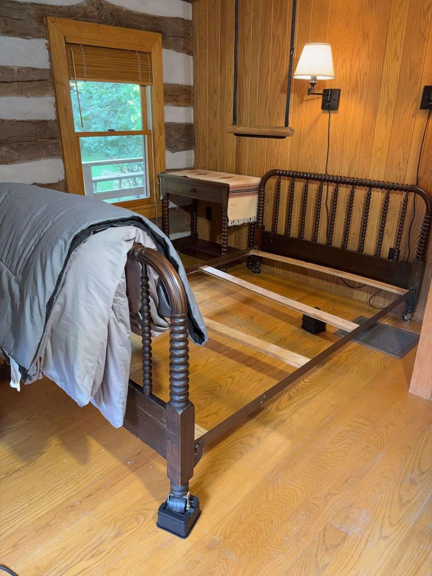 Twin bed frame with matching nightstand and comforter