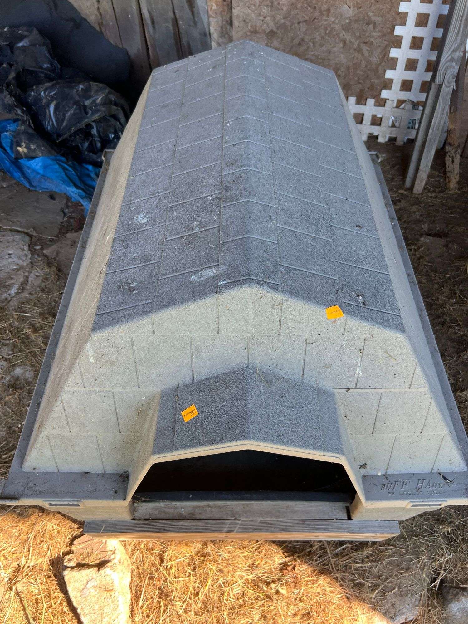Ruff Hauz Plastic Outdoor Dog House - Kaufman Realty & Auctions