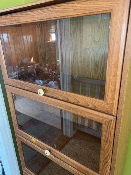 Unmarked Wooden Bookcase with Glass Doors