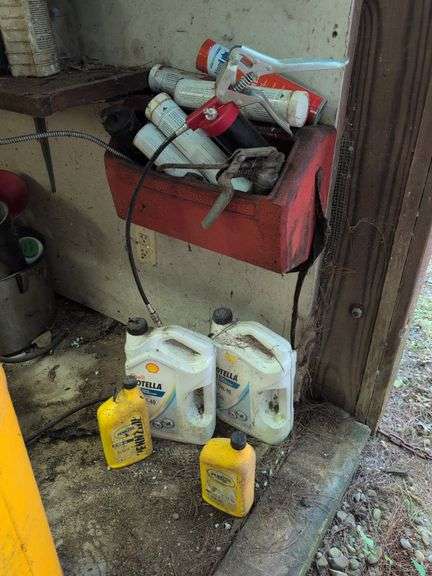 Grease guns, grease, and oil - partially full
