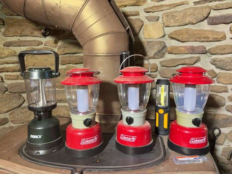 (3) matching Coleman lanterns, Dorcy lantern, and (2) flashlights