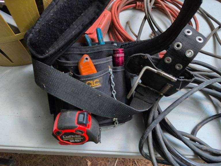 (2) tool belts with tools, extension cords, and other items