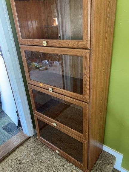 Unmarked Wooden Bookcase with Glass Doors