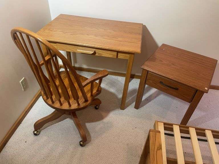 Wooden office desk, rolling chair, and stand