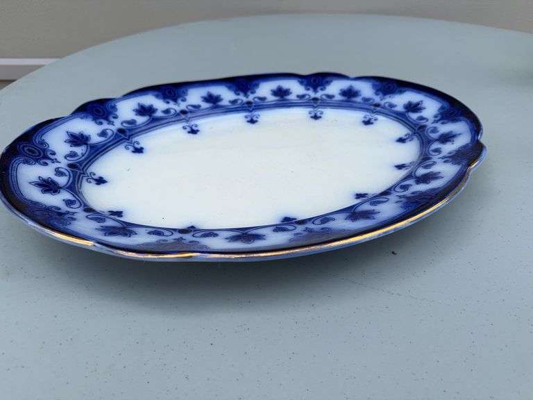 Blue and White Patterned Tea Pot w/ Sugar and Creamer, (2) Tea Cups w/ (2) Plates, and Serving Dish