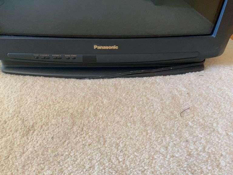Panasonic 27” Colored Television, Emerson Video Cassette Player, Mounting Box