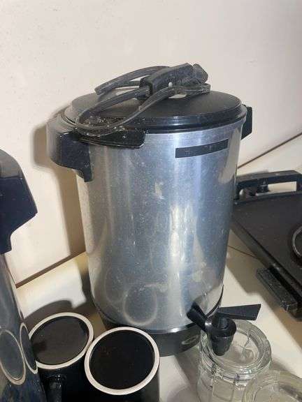 Griddle, mugs, (2) coffee warmers, and drinking glasses