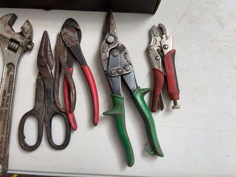 Flat of pliers, wrenches, snips, and other hand tools