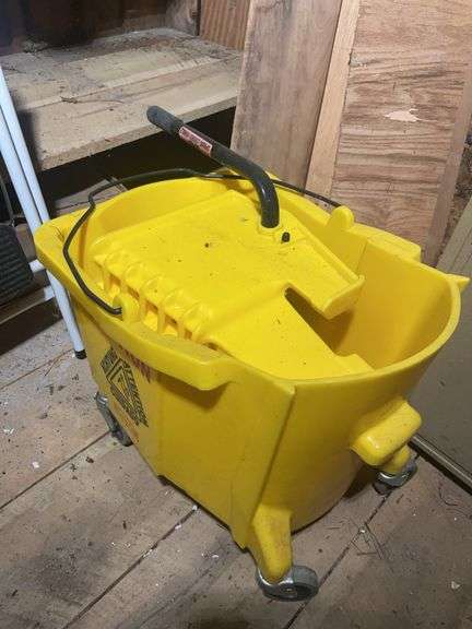 Small step ladder, mop bucket, and Coleman 3-way cooler